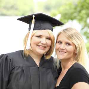 proud parent and international student at graduation ceremony